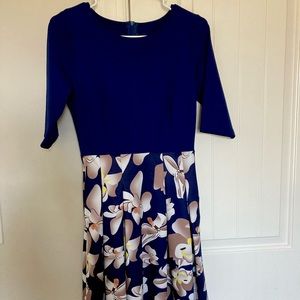 Fancy solid top and floral bottom knee length dress.